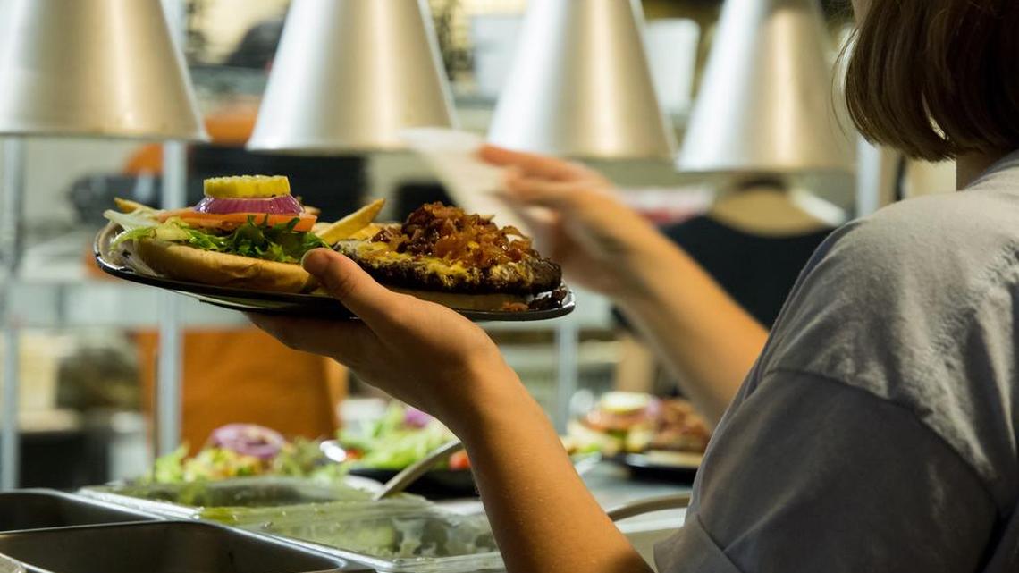 New Chapin restaurant Higher Ground Char House offers craft burgers and beers.