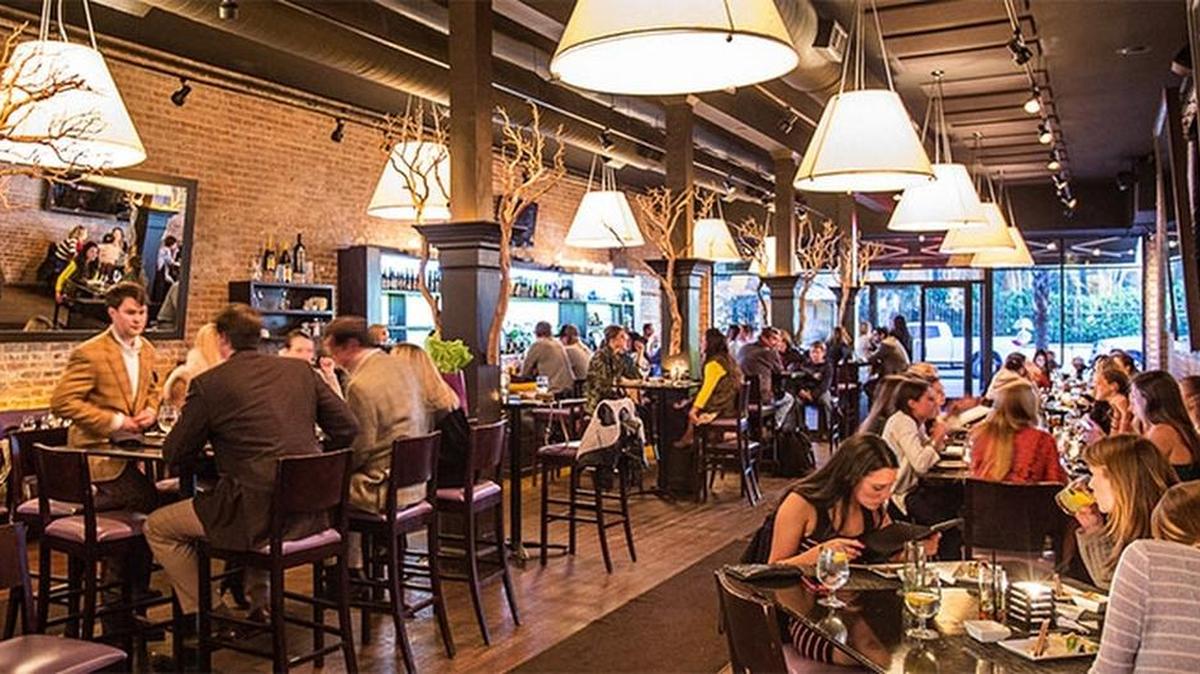 Indigo Restaurant Group’s O-Ku sushi restaurant (pictured here in Charleston) will open this weekend in Charlotte.