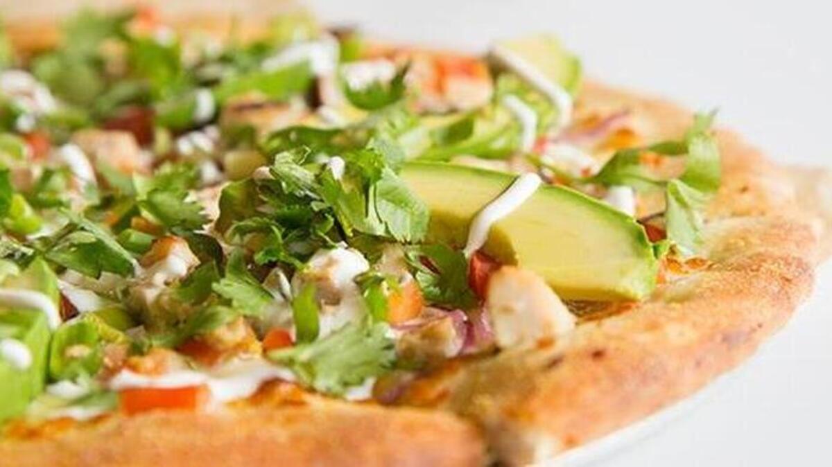 Z Pizza offers traditional pizza toppings as well as vegan and vegetarian options.