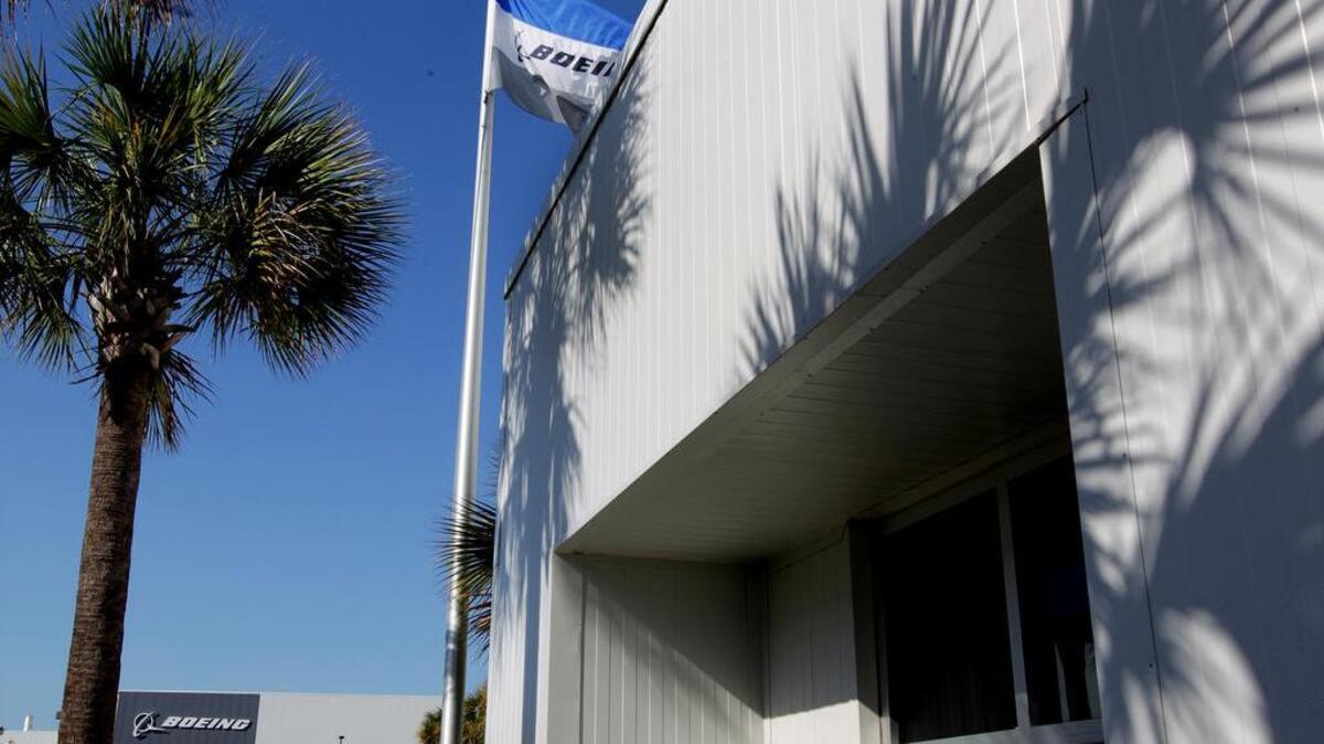 A Boeing flag flies over Boeing's North Charleston assembly plant.