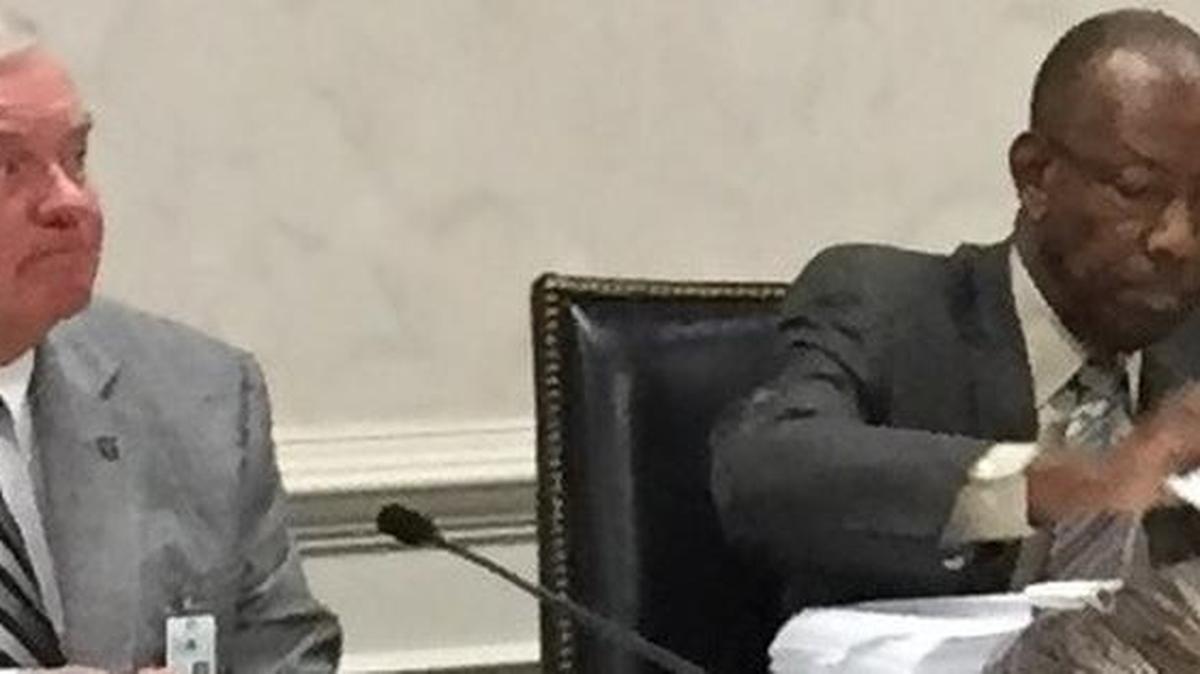 
DHEC board member Clarence Batts, right, questioned Thursday whether agency staff have been too hard on some businesses that recently received hefty fines. Board member Chuck Joye, left, looks on.
