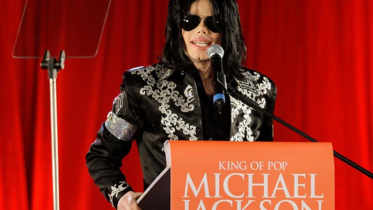 FILE - In this March 5, 2009 file photo, US singer Michael Jackson announces that he is set to play ten live concerts at the London O2 Arena in July, which he announced at a press conference at the London O2 Arena. Jackson and Sony Corp. announced Monday, March 14, 2016, that the singer's estate had sold its half interest in the massive Sony/ATV Music Publishing catalog to the company for $750 million. The catalog includes music by The Beatles, Bob Dylan and other stars, but the deal does not include rights to Jackson's master recordings or songs he wrote.