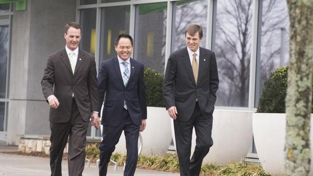 TD Bank CEO and President Mike Pedersen, right, walks with South Carolina Market President David Lominack and Greenville Contact Center Director Simon Hong at the TD Bank corporate office campus in Greenville on Tuesday, February 2, 2016.