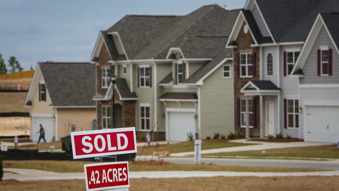 Midlands home builders are suing Lexington County to block a six-month moratorium on construction of new subdivisions.