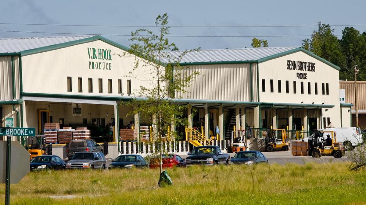 
Large produce companies are in the larger buildings at the SC State Farmer's Market. 
