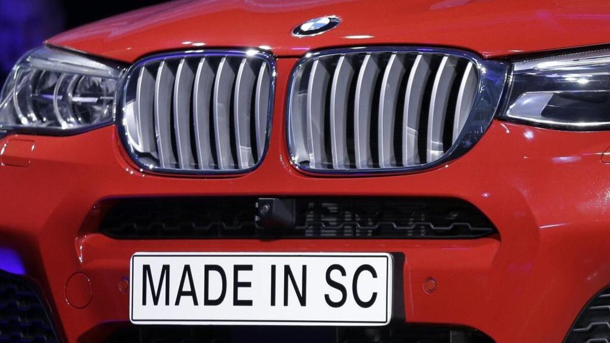 
In this March 28, 2014, photo, a "Made In SC" plate is shown on a new BMW X4 vehicle as it is unveiled during a news conference at the BMW manufacturing plant in Greer.
