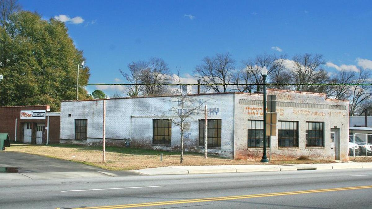 Studio 2LR plans to purchase and renovate the former Wilson Upholstery building at 2428 Main St.