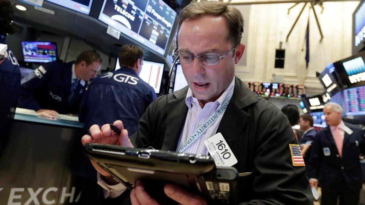 Trader George Baskinger works on the floor of the New York Stock Exchange, Friday, June 24, 2016. The Dow Jones industrial average dropped 611 points, or 3.4 percent, to 17,399 in heavy trading Friday. Stocks plunged in the U.S. and worldwide after Britain voted to leave the European Union.