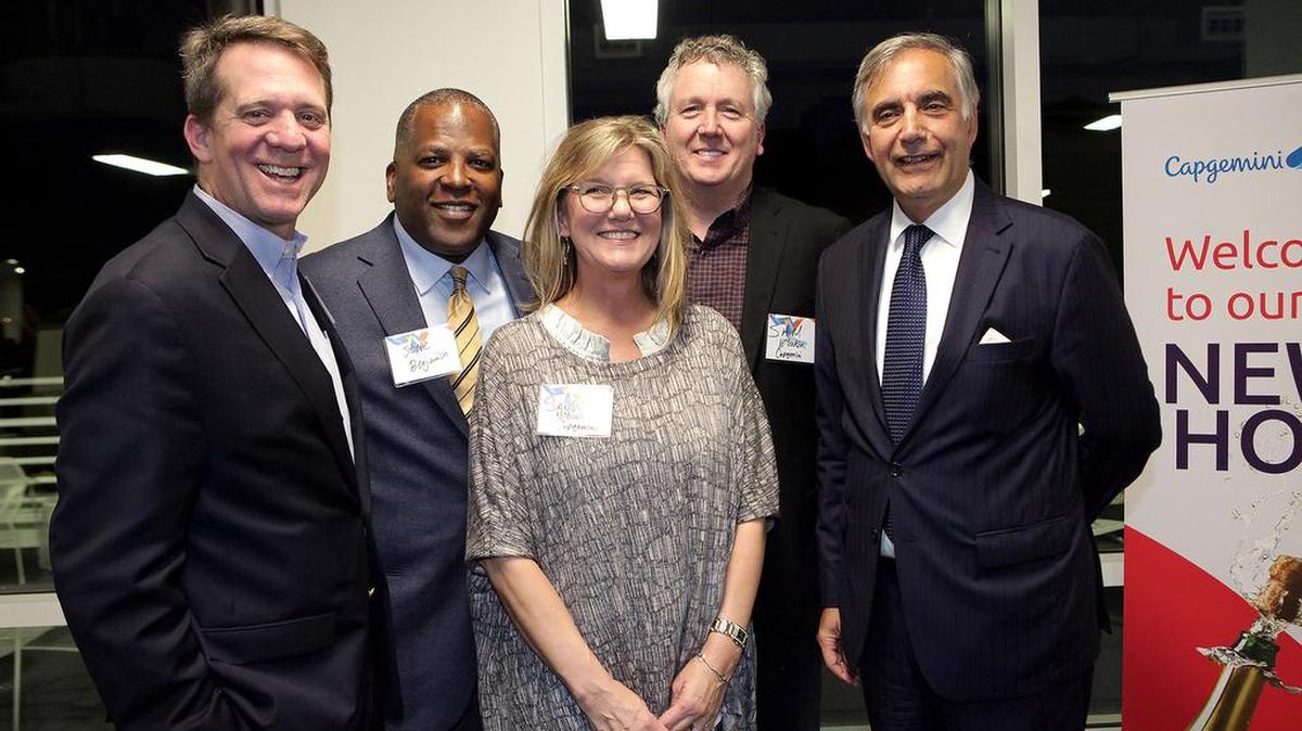 Capgemini opened an office at BullStreet in Columbia Dec. 5, 2017. From left, S.C. House Rep. James Smith; Columbia, S.C. Mayor Steve Benjamin; Sandy McGuckin, Senior Director, Capgemini of the Americas; Sam McGuckin, EVP, Capgemini of the Americas; Dr. Harris Pastides, president of the University of South Carolina