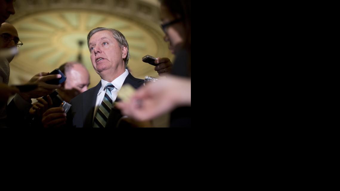 
FILE - In this Oct. 16, 2013, file photo, Sen. Lindsey Graham, R-S.C., speaks with reporters on Capitol Hill in Washington. 
