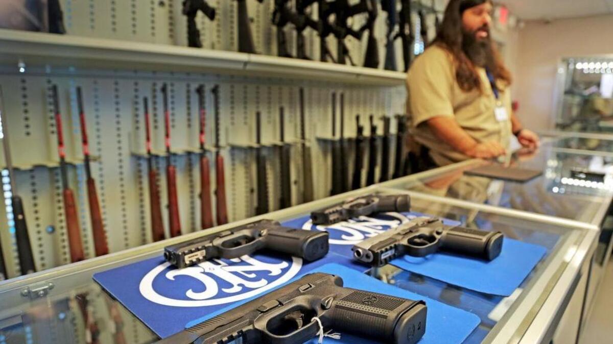 Mo Yunis talks about the some of the firearms inside FN America’s new ProShop on Two Notch Road in Columbia, Wednesday, April 27, 2016.