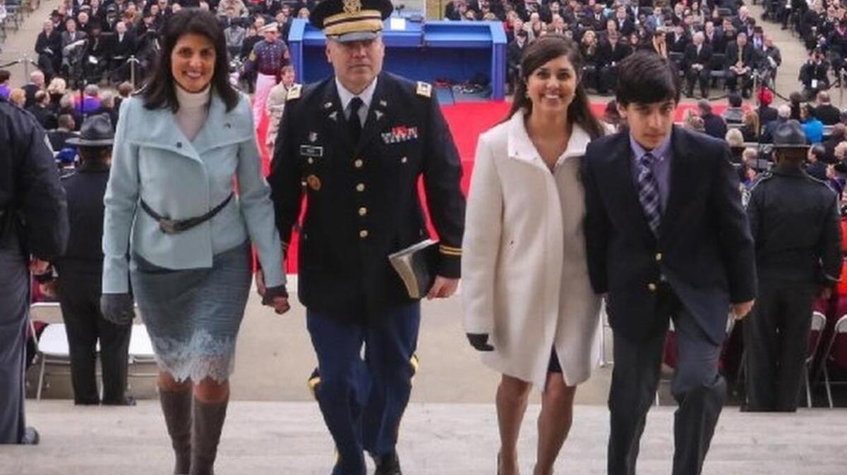 SC Gov. Nikki Haley may not have a typical life but she is a working mom and leader of a state listed as one of the worst for working moms. (Here she is pictured with her husband, Michael, and daughter and son, Rena and Nalin, in January 2015.)