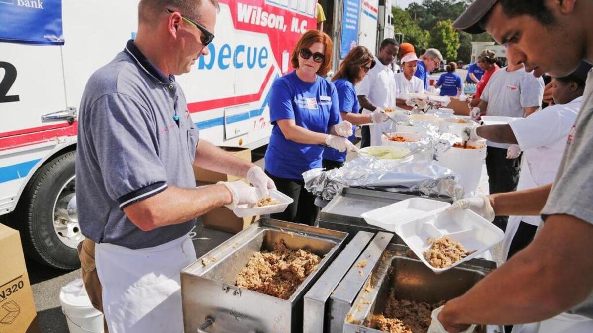 
First Citizens Bank partnered with Bill Ellis Barbeque to provide free meals during lunch hour at Trenholm Plaza in Columbia, SC, Friday, October 9, 2015. 
