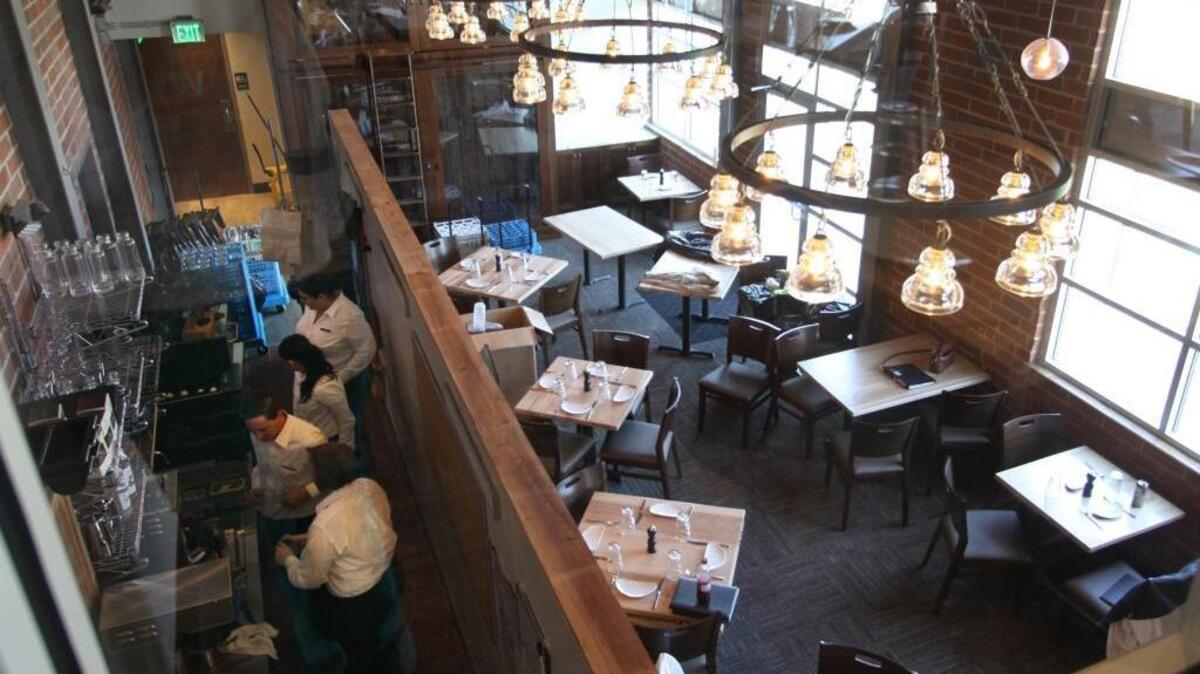 Food servers at Pump House train Tuesday.