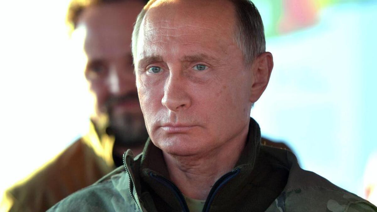 Russian President Vladimir Putin visits a reserve for wild horses near the Urals city of Orenburg, about 1300 kilometers (800 miles) southeast of Moscow, Russia, Monday.