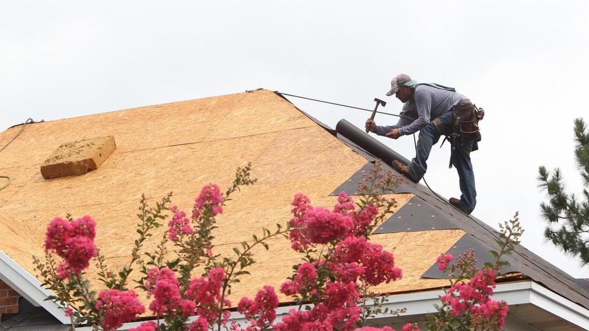Construction companies say they face a shortage of roofers and other workers.