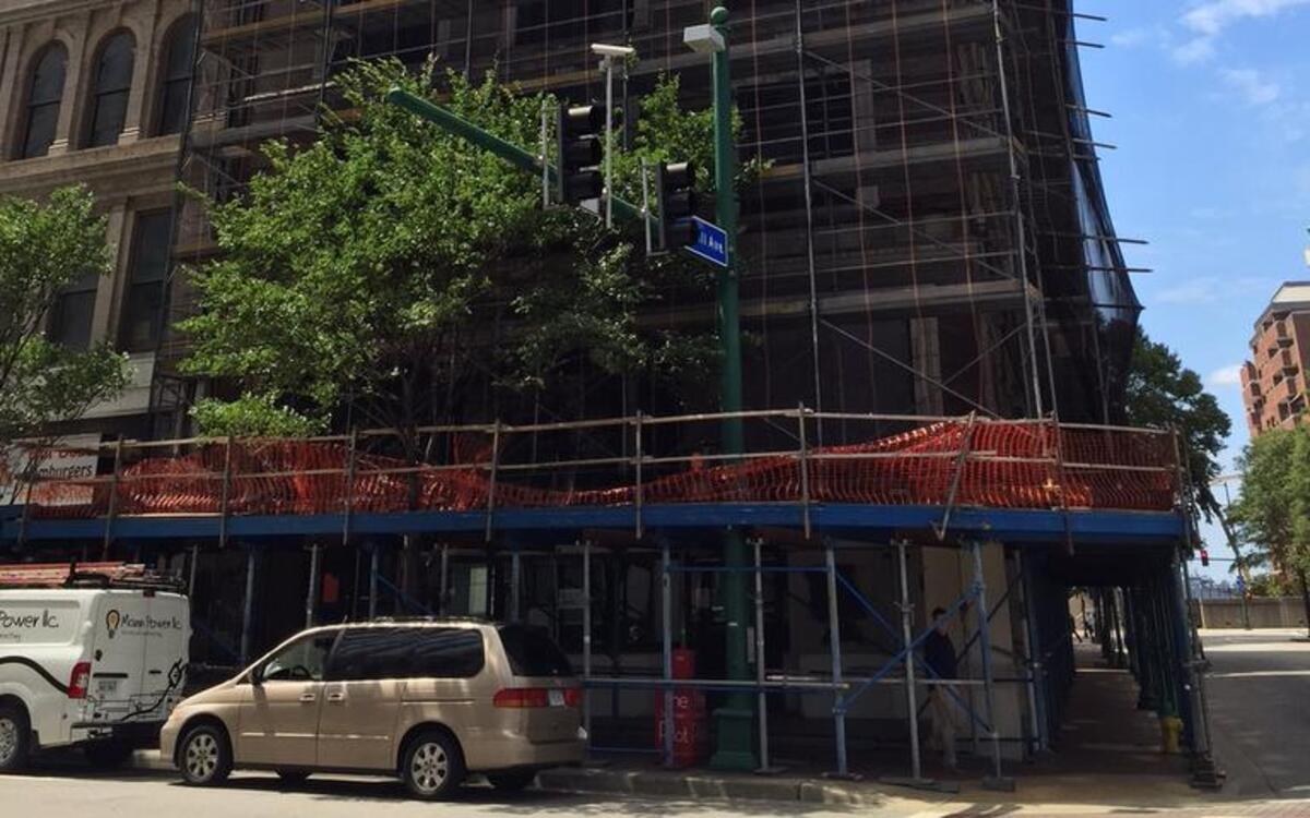 
Top to bottom scaffolds and nets cover the ‘Leaning Tower of Granby’ in downtown Norfolk, Va.
