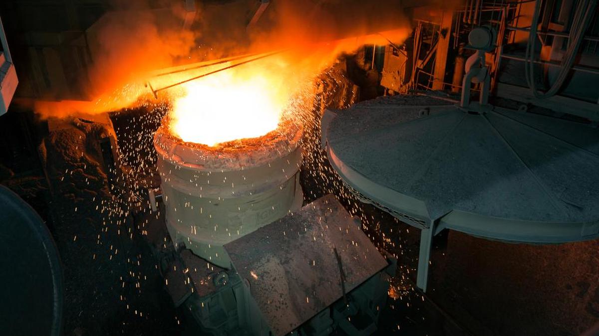 Molten steel is poured from the electric arc furnace into a bucket at the Nucor Steel plant in Huger, S.C., in April. President Donald Trump’s vow to protect the steel industry could have unintended consequences for steel fabricators.