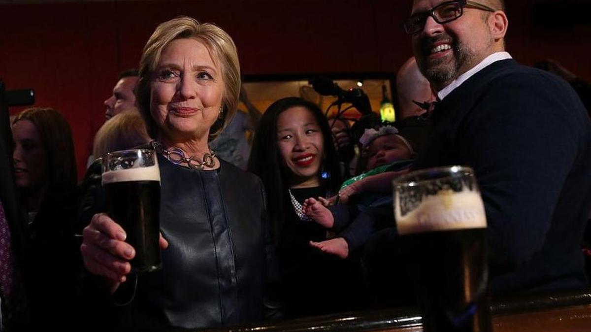 Democratic presidential candidate Hillary Clinton enjoys a pint of Guinness while campaigning in the Midwest.
