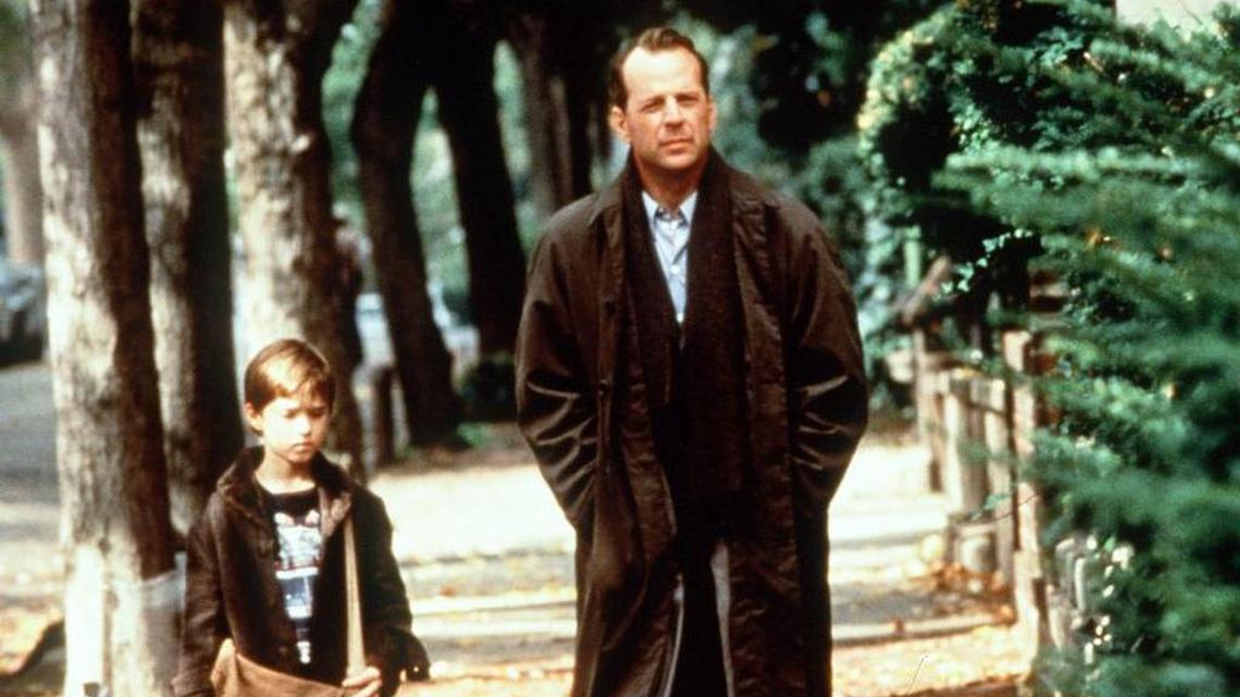 Left to right: Haley Joel Osment and Bruce Willis in "The Sixth Sense"
