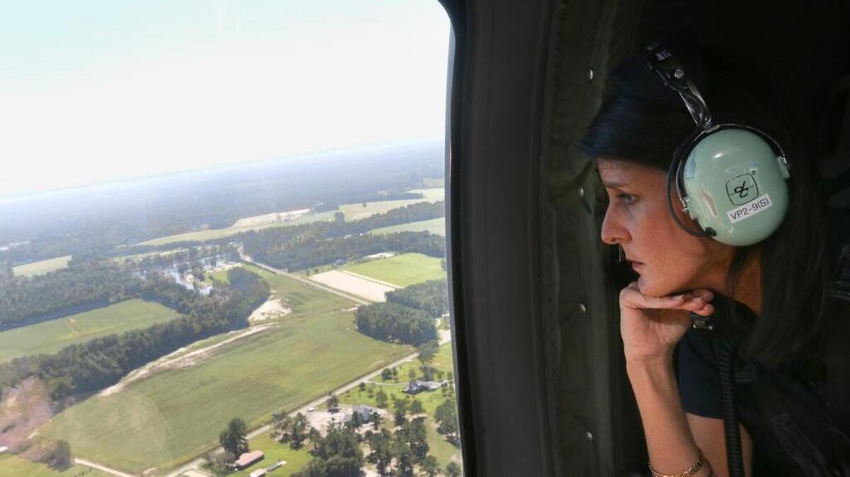 South Carolina Governor Nikki Haley assesses flood damage in Horry County from a U.S. Army helicopter.