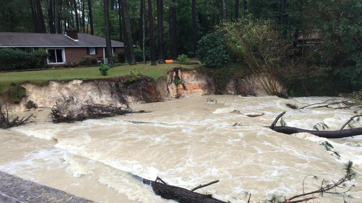 Part of an eroded area below the lower Rockyford Lake dam after the spillway burst in the early-October flooding.