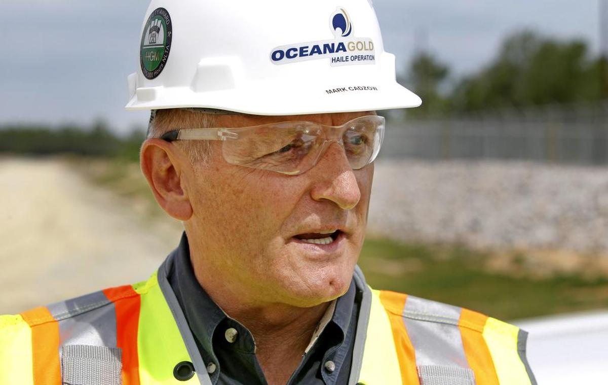 Mark Cadzow, Executive Vice President & Chief Development Officer, talks about the mining process during a tour of OceanaGold Haile Operation Thursday, April 27, 2017.