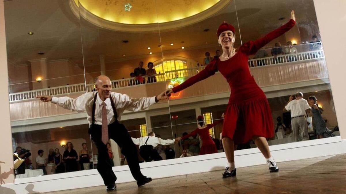 
Richard Durlach and Breedlove dance to swing music at the Big Apple in August 2003.
