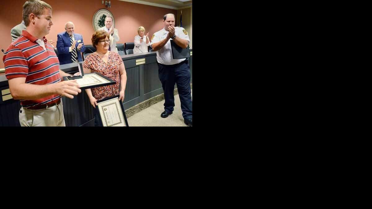 
Justin Hart, left, and Lea Hawkins are applauded after Hart was awarded the Civilian Life-Saving Medal and Hawkins the Civilian Meritorious Commendation by the City of Hardeeville Fire Department during Wednesday's Hardeeville Town Council meeting. The awards were for actions that saved two lives during a water rescue as the result of a motor vehicle accident on March 5.
