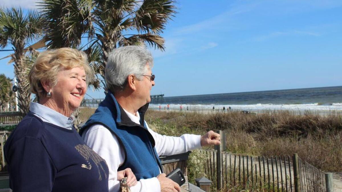 Jessie and John Rodriguez look out on a sunny coastline in Myrtle Beach, where they fell in love 49 years ago.