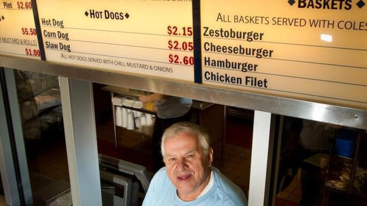 Zesto owner Gus Manos, 77, whose restaurant specializes in fried chicken, hamburgers and ice cream, is there six days a week working with the chorus line of cooks and servers feeding customers. He’s retiring as a Springdale town councilman after 42 years in office.
