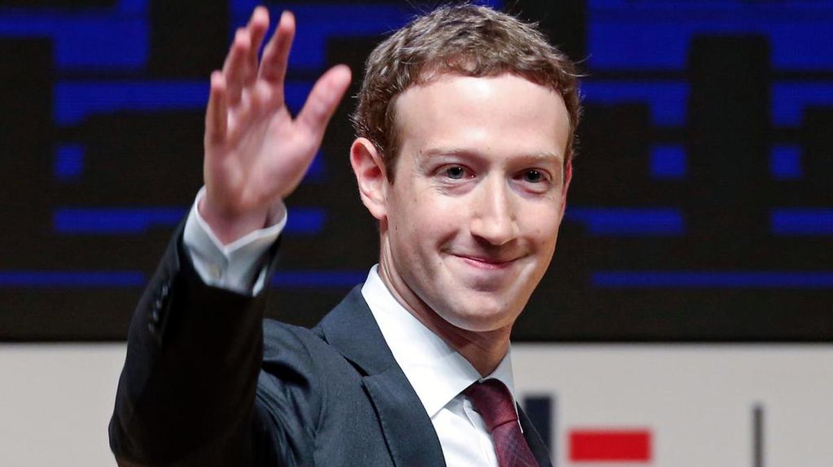 In this Nov. 19, 2016 file photo, Mark Zuckerberg, chairman and CEO of Facebook, waves at the CEO summit during the annual Asia Pacific Economic Cooperation (APEC) forum in Lima, Peru. Zuckerberg released a missive Thursday, Feb. 16, 2017, outlining his vision for the social network and the world at large. Among other things, Zuckerberg hopes that the social network can encourage more civic engagement, an informed public and community support in the years to come.