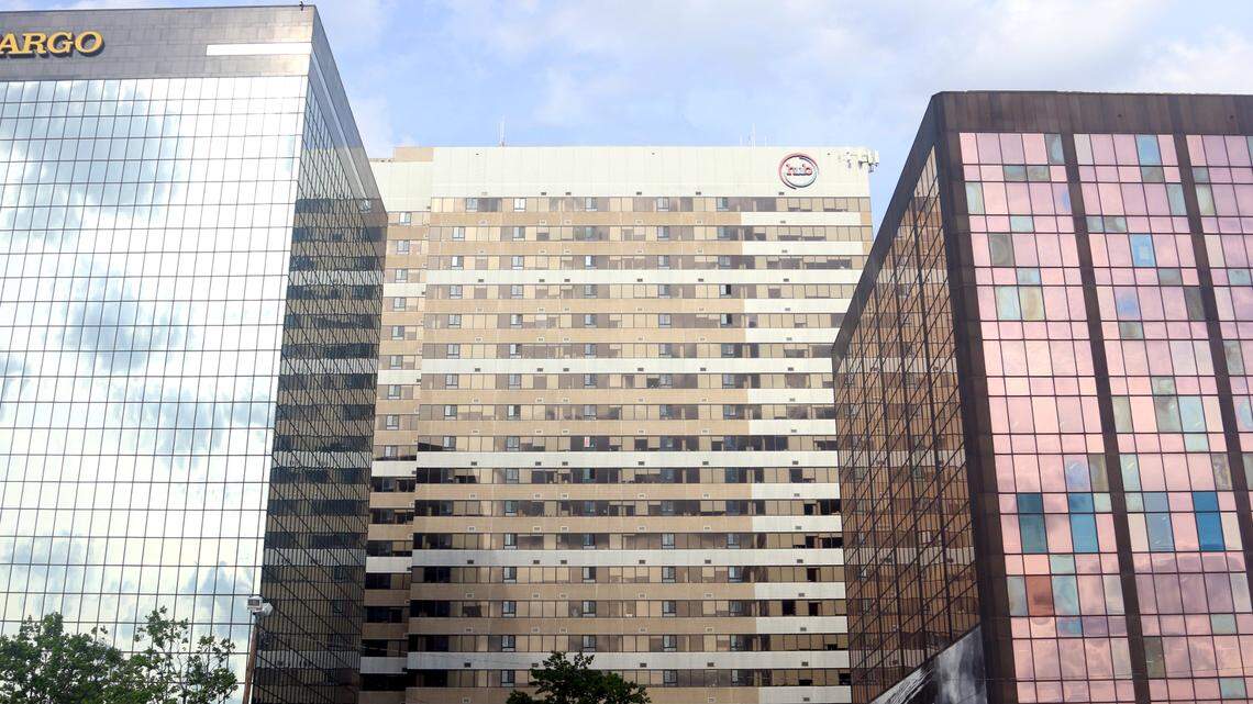 A new housing project would fill one of the few remaining gaps along the core blocks of Columbia’s Main Street with a pair of high-rises.