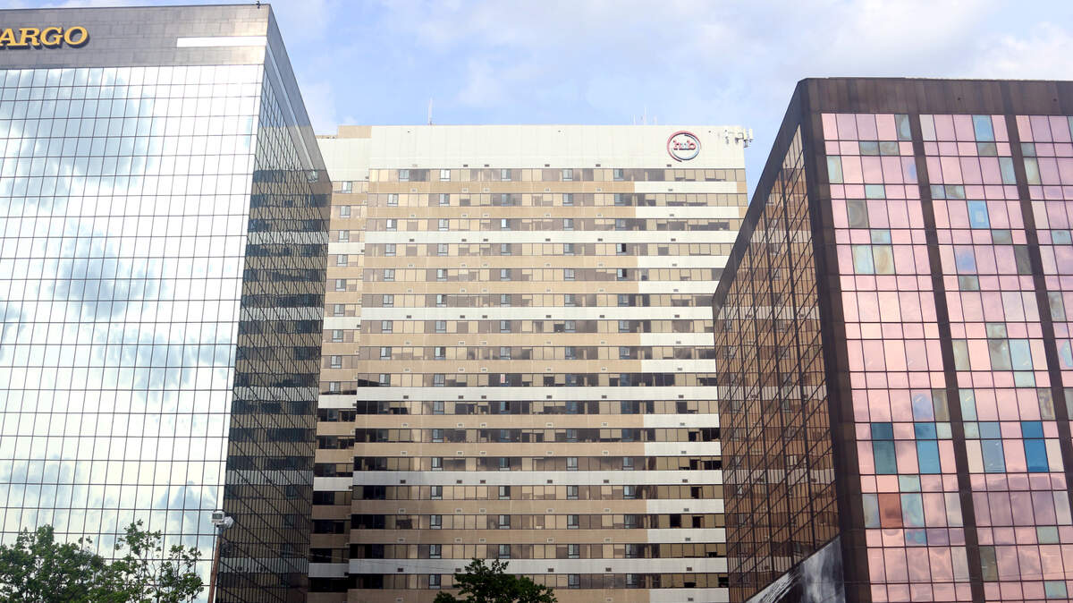 A new housing project would fill one of the few remaining gaps along the core blocks of Columbia’s Main Street with a pair of high-rises.