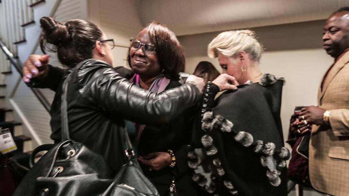 Felicia Sanders, who watched her son and an aunt die at the hands of Dylann Roof, greets well-wishers Dec. 15 after Roof was found guitly of killing nine parishoners at Emanuel AME Church in Charleston.