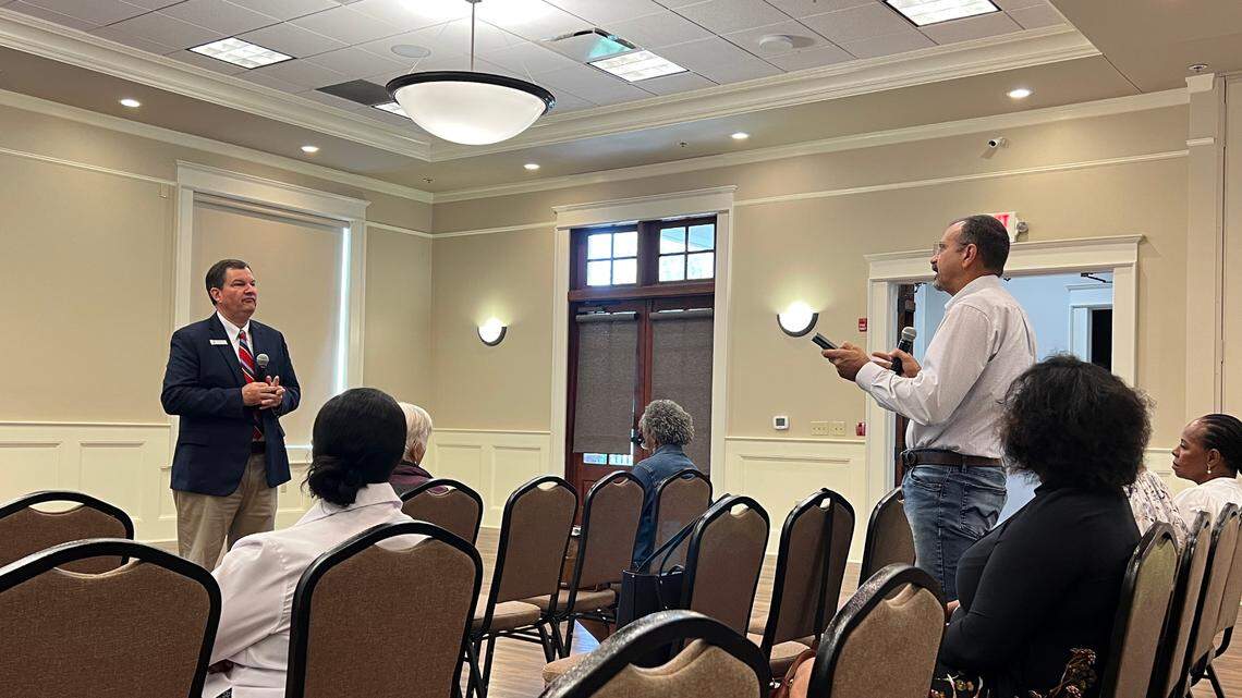 A resident poses a question to Municipal Association of South Carolina representative Charlie Barrineau during a July 7 information session on Blythewood’s upcoming referendum to change its form of government.