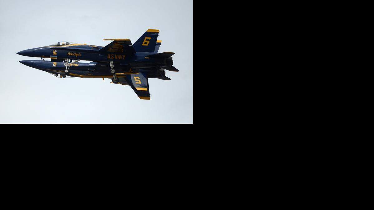 
Two Blue Angels pilots fly in formation during their portion of the MCAS Beaufort Air Show on Saturday afternoon on the Marine Corps Air Station Beaufort. 
