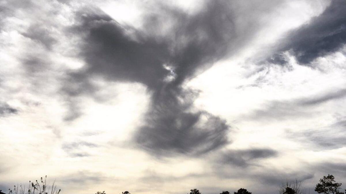 Michaela Chewar took this photo this weekend of shadows in the clouds that appeared to form the shape of an angel.