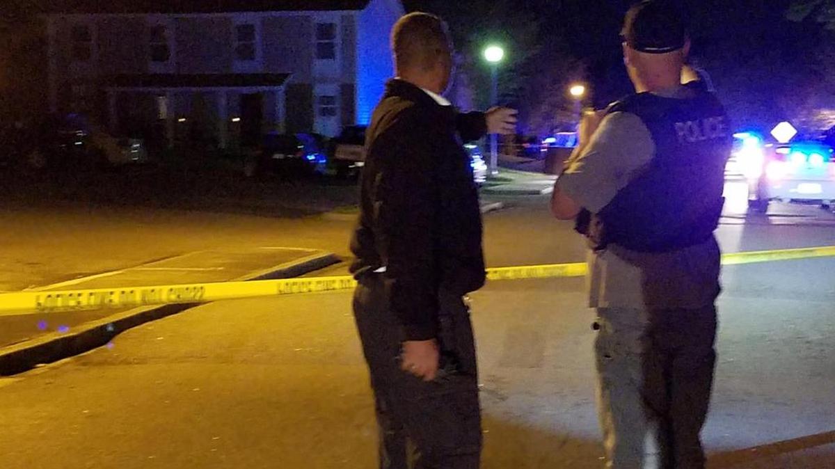 Officers investigate a drive-by shooting at Hammond Village Apartments in North Columbia.