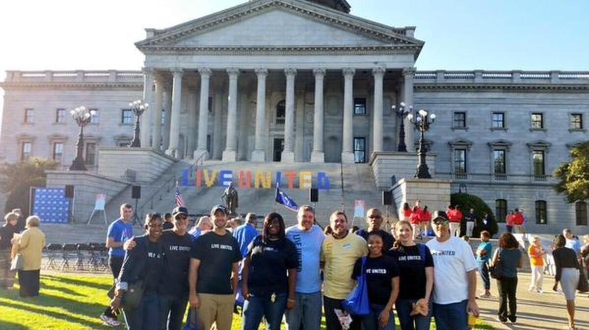 
Volunteers celebrate United Way Day at the State House.

