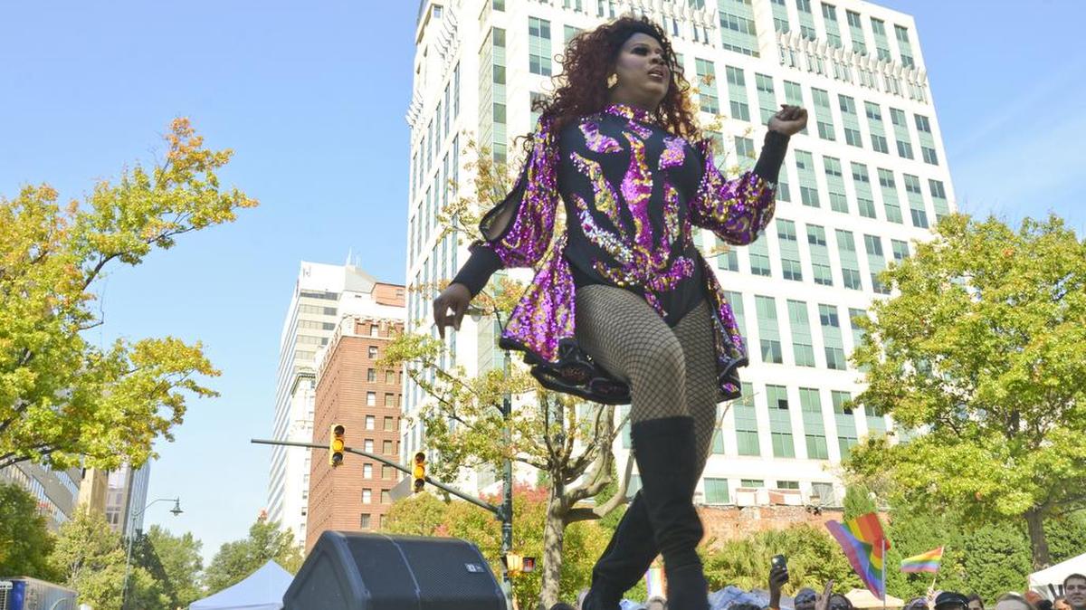 Female impersonator Paris performs for the crowd Saturday at Columbia’s Gay Pride Festival.