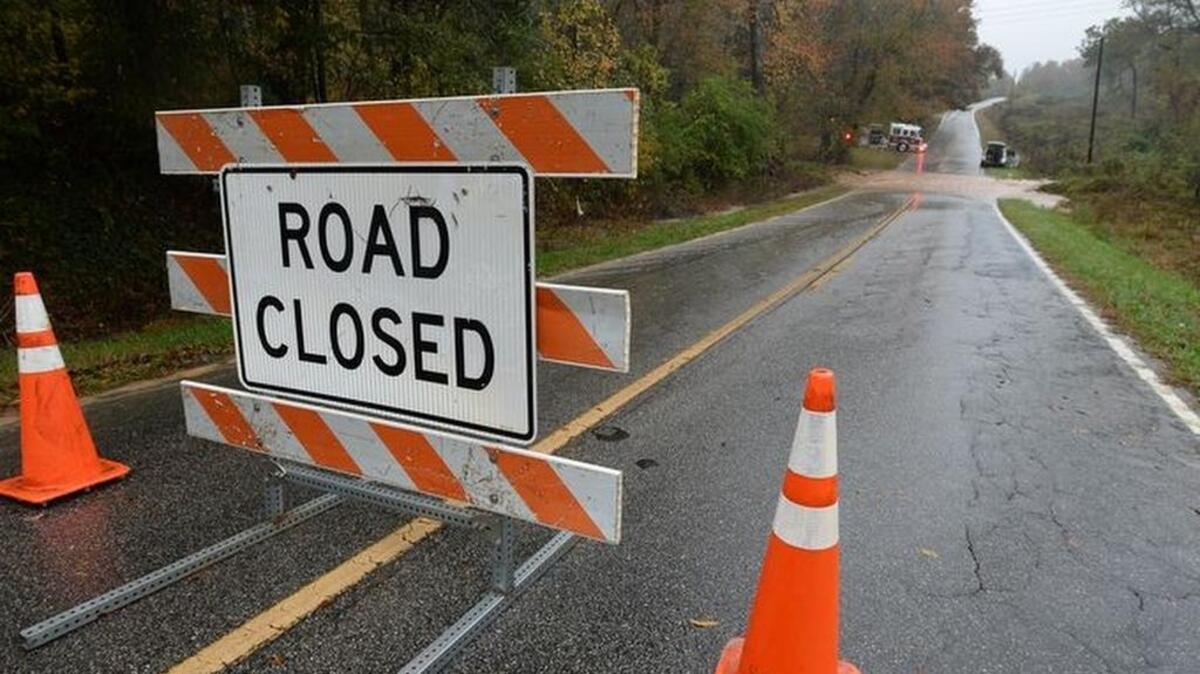 A portion of West Georgia Road in southern Greenville Co. was closed Monday, November 2, 2015 after Huff Creek, a tributary of the Saluda River, overflowed across the road.