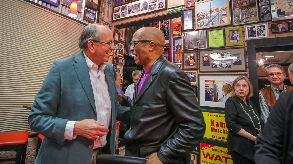 Top City Council vote-getters in their respective races, Howard Duvall and the Rev. Ed McDowell celebrate early returns Tuesday night. Duvall will face Andy Smith in the Nov. 17 runoff for the at-large seat. McDowell will face Aaron Bishop in the District 2 runoff, also on Nov. 17.