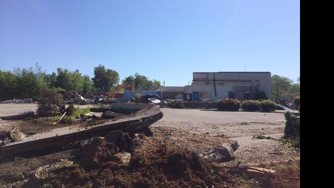 
Demolition crews work to clear the debris of the Greyhound’s Gervais Street bus terminal on Tuesday. 

