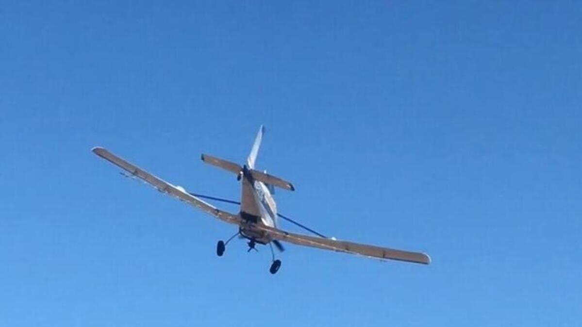Crop dusting plane flies over Aiken County recently