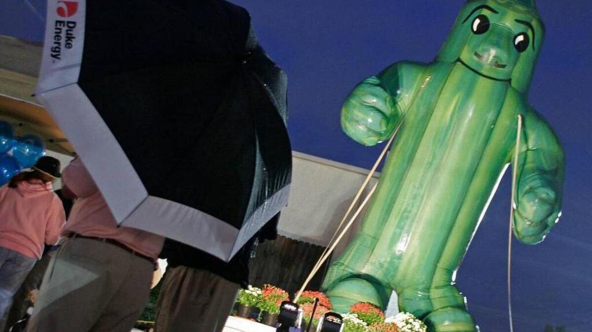 
A giant inflatable Okraman towered above folks at the Okra Strut Street in 2008.
