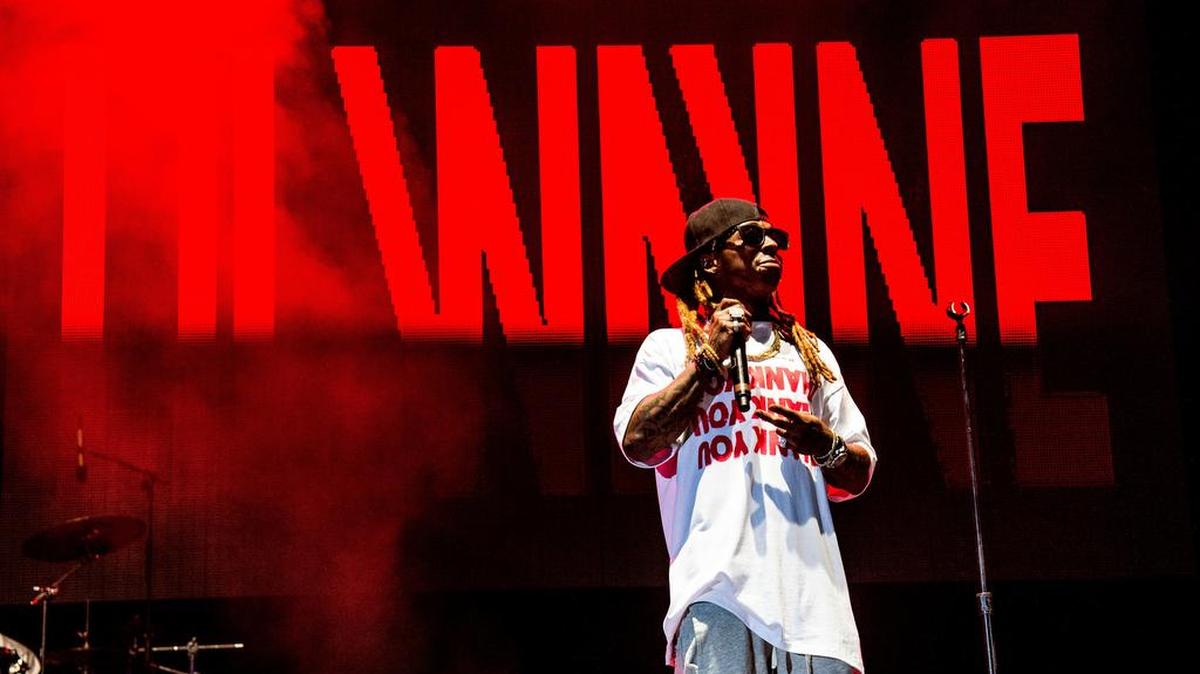 FILE - Lil Wayne performs at the Lil' WeezyAna Fest at Champions Square on Friday, Aug. 25, 2017, in New Orleans. Fans of rapper Lil Wayne will be offered refunds after the recording artist on Saturday, Sept. 30, 2017 refused to pass through a security check to enter the Colonial Life Arena in Columbia, and skipped the concert.
