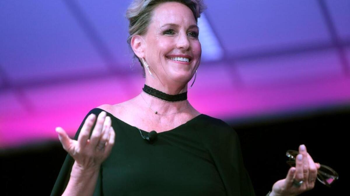 Erin Brockovich speaking at the 2016 Arizona Ultimate Women's Expo at the Phoenix Convention Center in Arizona.