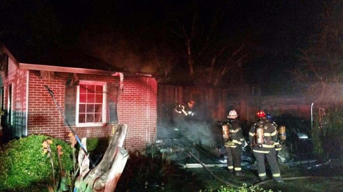 A house and vehicle fire displaced two adults in Columbia overnight.
