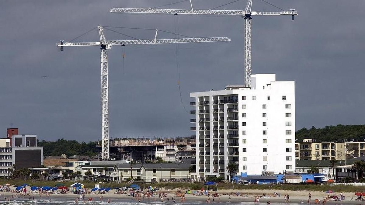 Developers built towering condominium projects on land that was freed from oceanfront building restrictions at Cherry Grove in North Myrtle Beach. The state loosened the rules because taxpayers spent $20 million widening the beach at Cherry Grove, a section of North Myrtle Beach long known for its beach houses and homey feel. State legislators are tightening the rules after years of discussion.